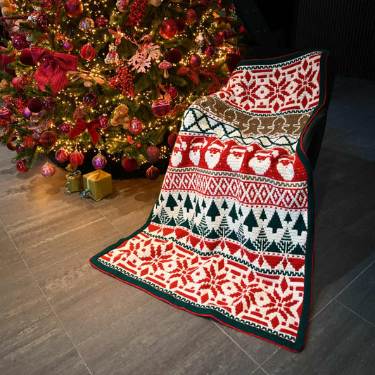 Yuletide Snuggles (Mr. Christmas Presents: Het magische kersthaakboek)